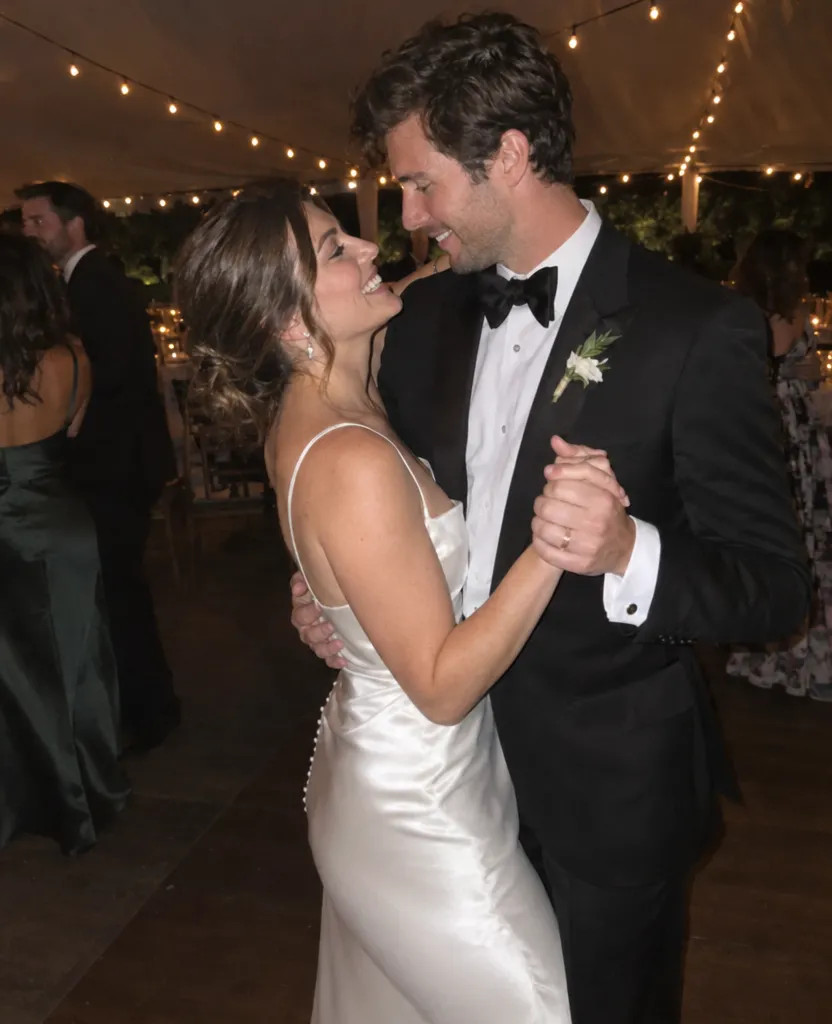 Original phone photo of a wedding couple dancing at their reception