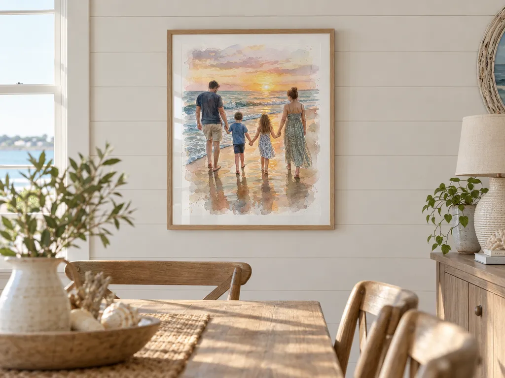 Watercolor of a family on a beach in an oak frame above a coastal dining table